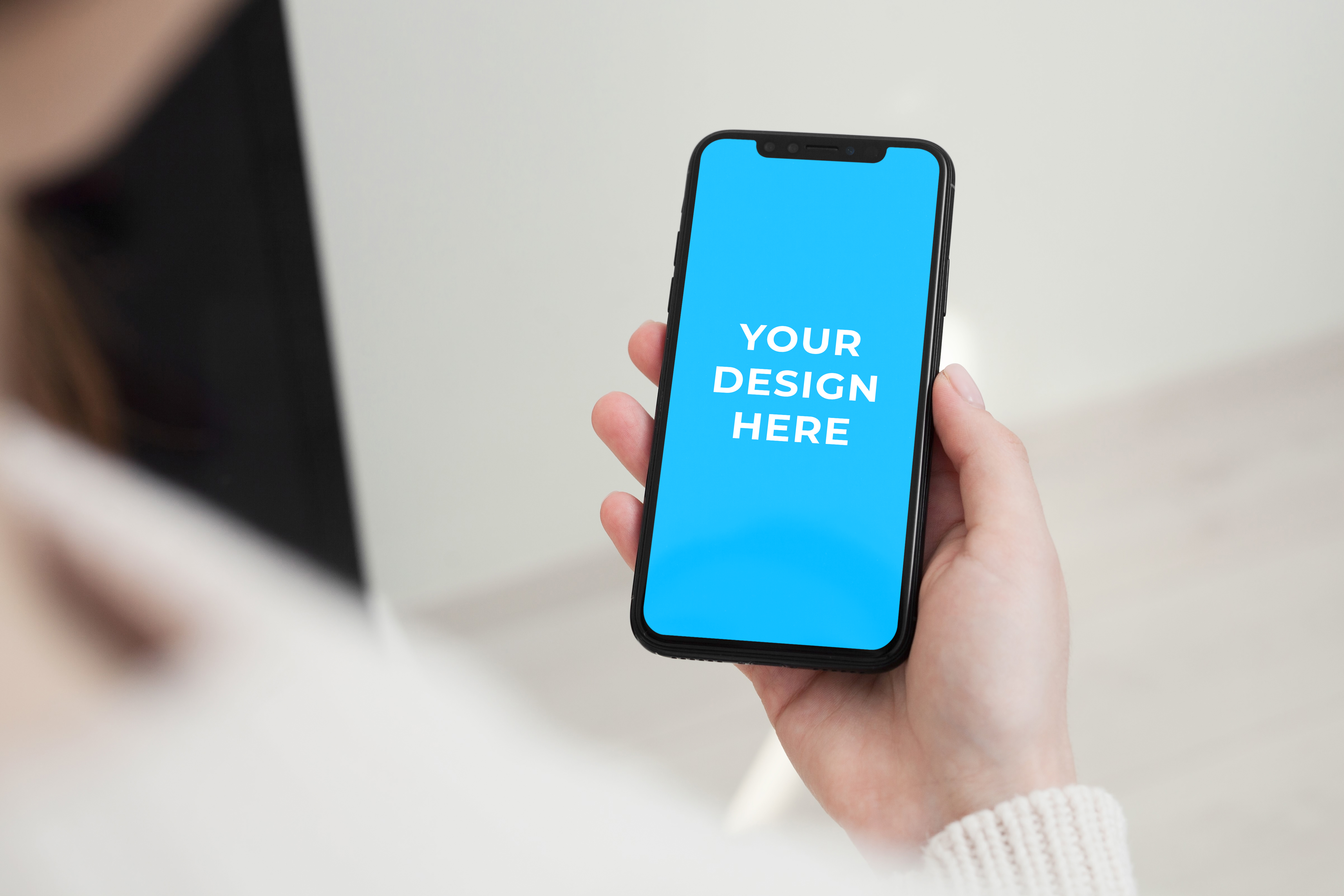 Free iPhone X in the hands Mockup generator Smartmockups