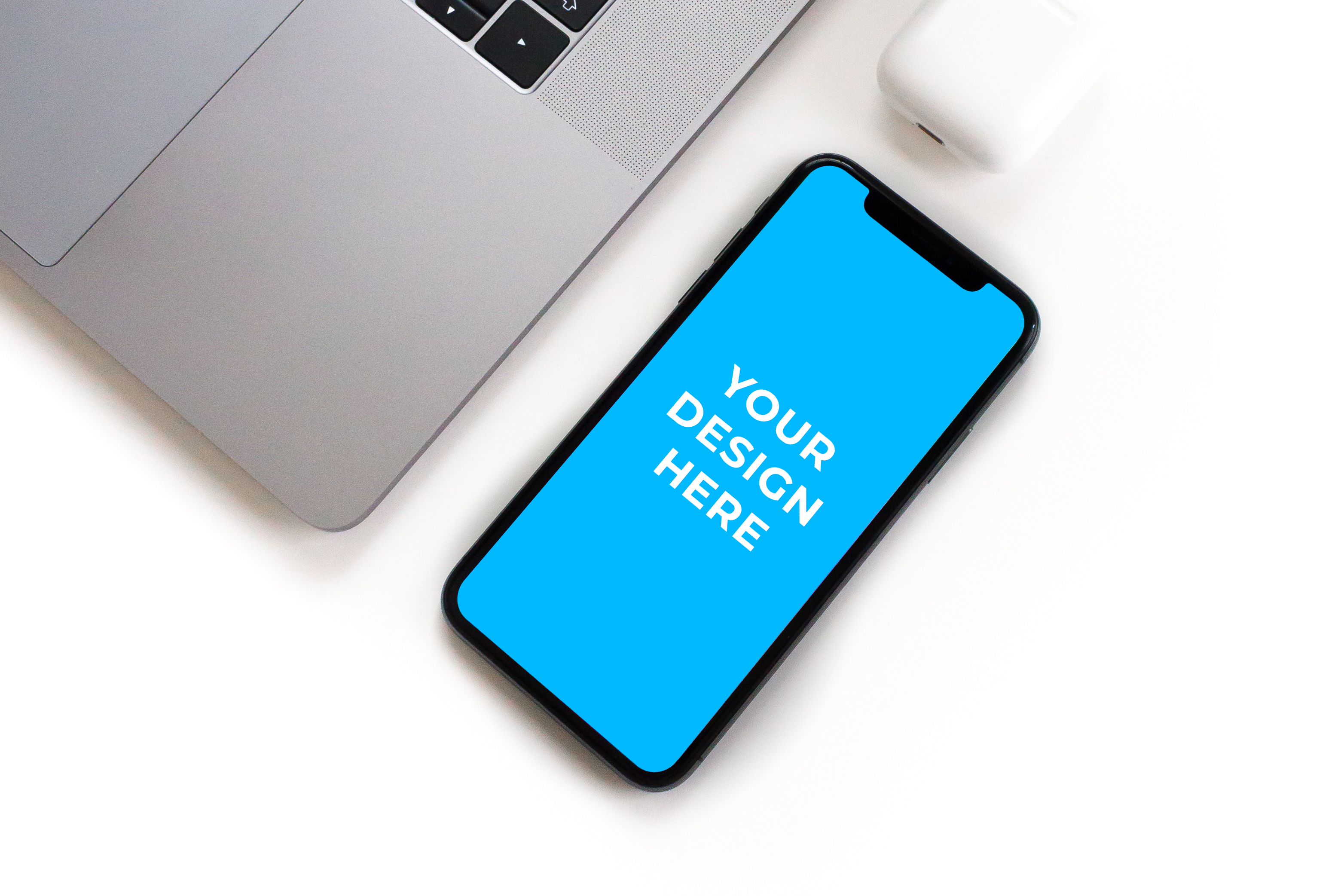 Download Free iPhone X on white desk with laptop Mockup generator ...